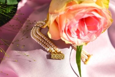 pearl bracelet and rose